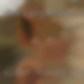 Older naked woman pissing